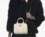 The Turnlock Crossbody Tote Bag white